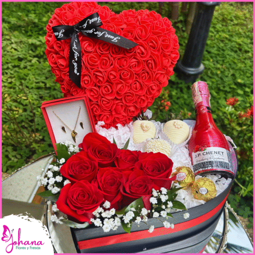 Caja de regalo romántica con rosas, chocolates y espumante